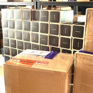 K-pop albums packed and cartons sealed with KOLIVERY branding